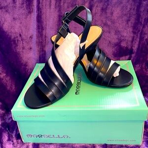 Marbella women’s sandals, size 8, color navy blue.  3 inch heel.